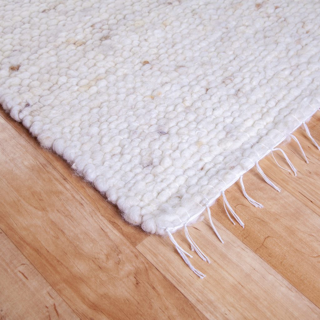 Gyapjú szőnyeg 70×200 cm – Natúr színben kevés melírozással - sarok