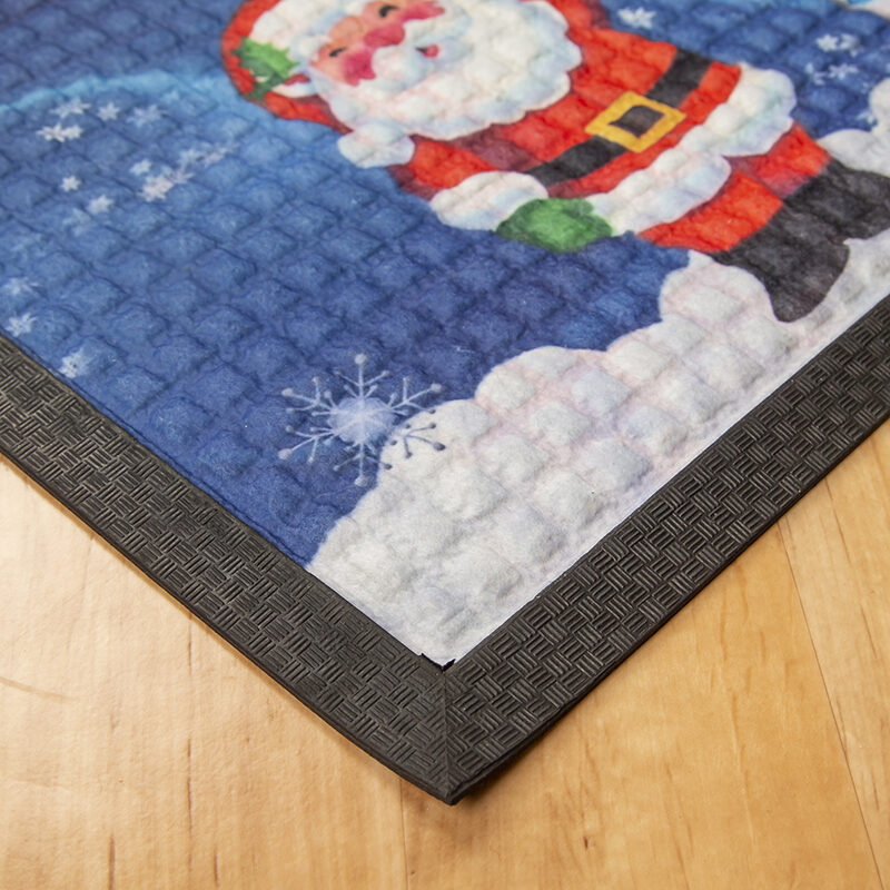 Festett gumis textil lábtörlő 40x60 cm - Karácsonyi mintával, kék háttérrel - sarok