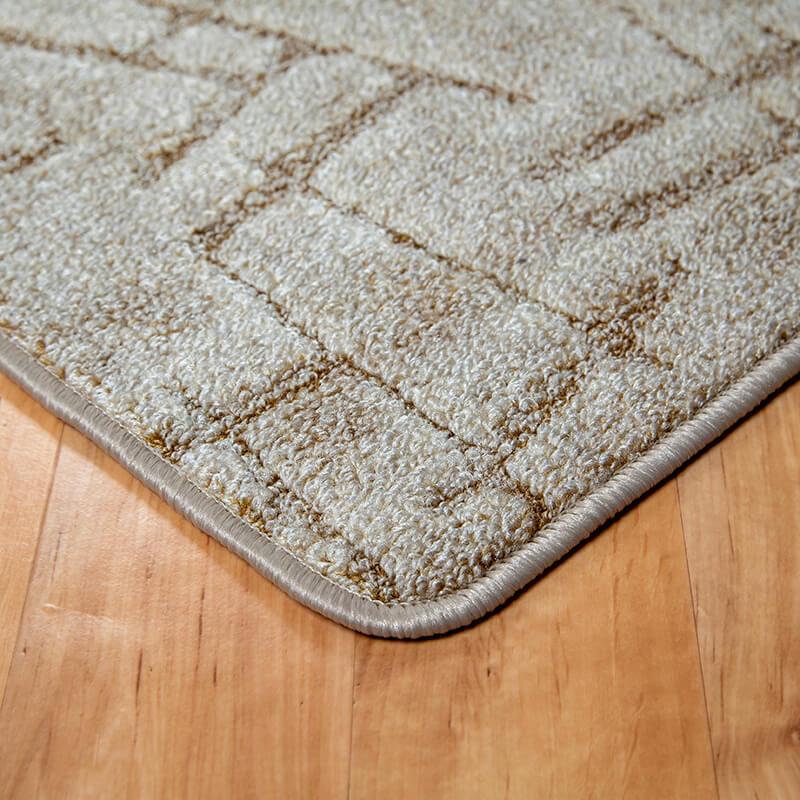 Szegett szőnyeg – Beige színben vonal mintával - sarok
